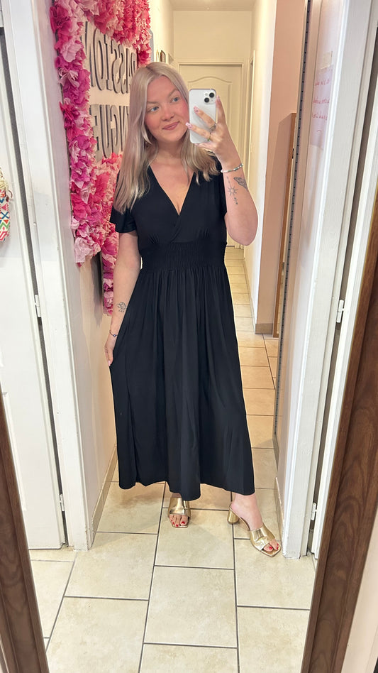 Robe magique noire à manches